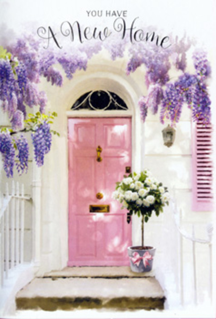 At a peaceful doorway that could easily sit along a leafy Barnet side street near Hadley Highstone or Ravenscroft Park, a scene of quiet celebration unfolds beneath a gentle cascade of wisteria. The wisteria's blossoms hang in abundant clusters of soft lavender and mauve, their trailing vines framing a perfectly painted pink door that almost seems to blush in the afternoon light. The surrounding walls are whitewashed and slightly textured, catching the glow of the sun so that pale highlights and muted shadows dance around the doorframe. A single shutter, dusted in a matching pastel tone, adds balance and charm, suggesting a cosy home just beyond. Resting on the doorstep is a chic grey tin bucket, sturdily made yet softened by the floral abundance it holds: a lush gathering of white and cream roses, each bloom opening in velvety spirals. Between the roses, subtle sprays of fresh greenery and muted, silvery foliage peer out, giving the arrangement a relaxed, garden-inspired fullness. A pastel pink ribbon is tied in a loose, elegant bow around the bucket, the ends trailing just slightly so they echo the drape of the wisteria overhead. The imagined fragrance is exquisite-a mingling of sweet wisteria and gently perfumed roses that might greet anyone coming home from a stroll through Barnet's markets or a walk across Tudor Park. The atmosphere of the entire composition radiates tranquillity and optimism, as if the flowers and the painted door together are offering their own warm, wordless blessing for whoever is stepping into a new home and a hopeful future in Barnet.
